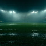 Empty football stadium under floodlights at night - football player bio for Instagram